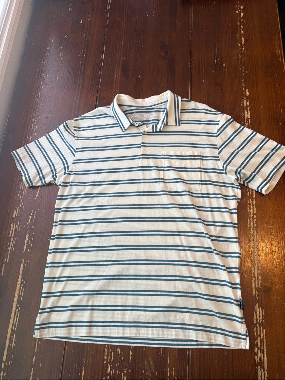 Patagonia White/cream Polo with Teal Stripe Detail